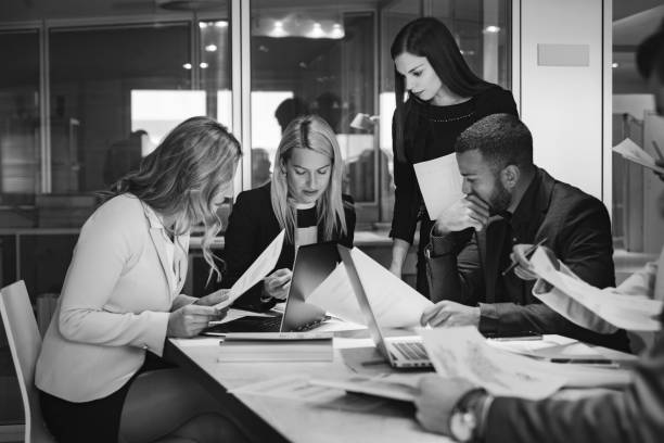 Business professionals turning a meeting into an action plan