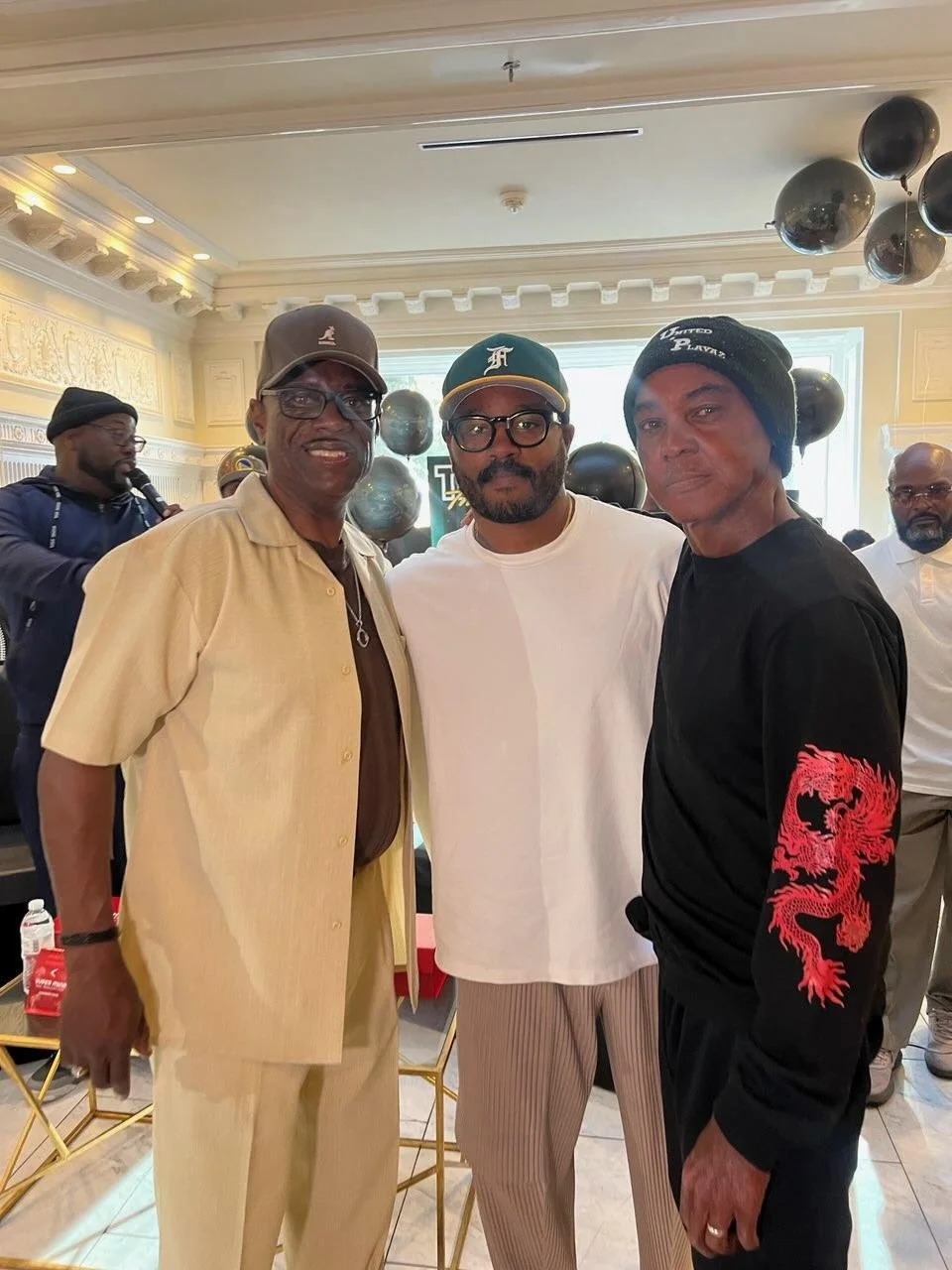 Oscar Grant Jr. with supporters at a United Playaz community gathering